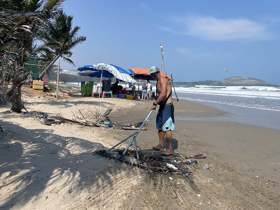 Kitesurfers cleaning beach in muine